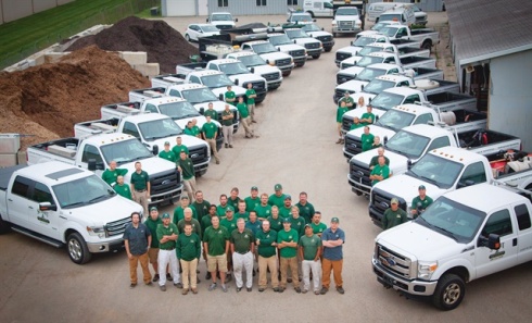 The Summit Landscape Management team with its truck fleet. Photo courtesy of Summit Landscape Management